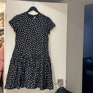 Kids midi dress simple and cute with tulle at the bottom and zipper at the back.